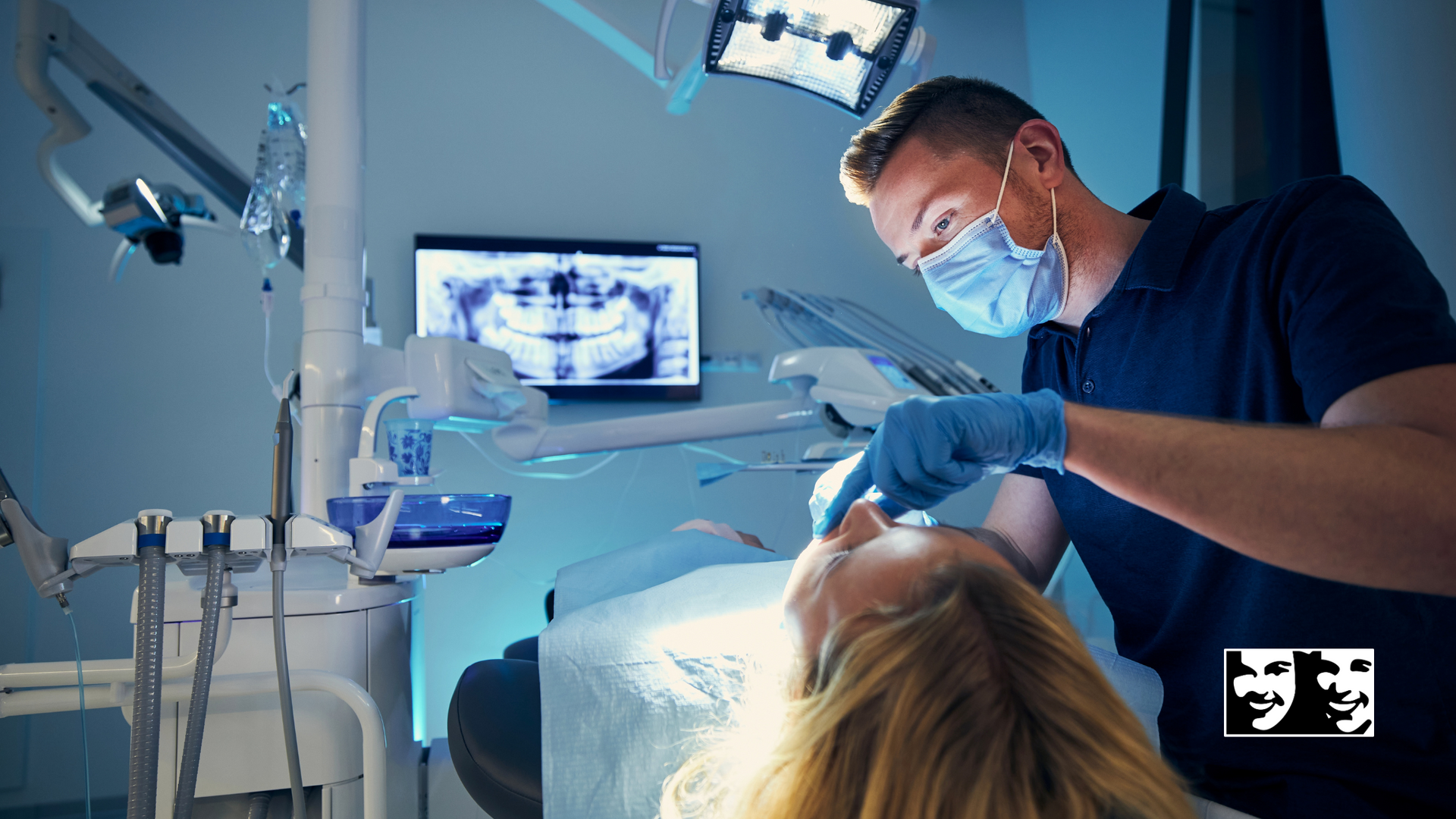A dentist is examining a woman 's teeth in a dental office.
