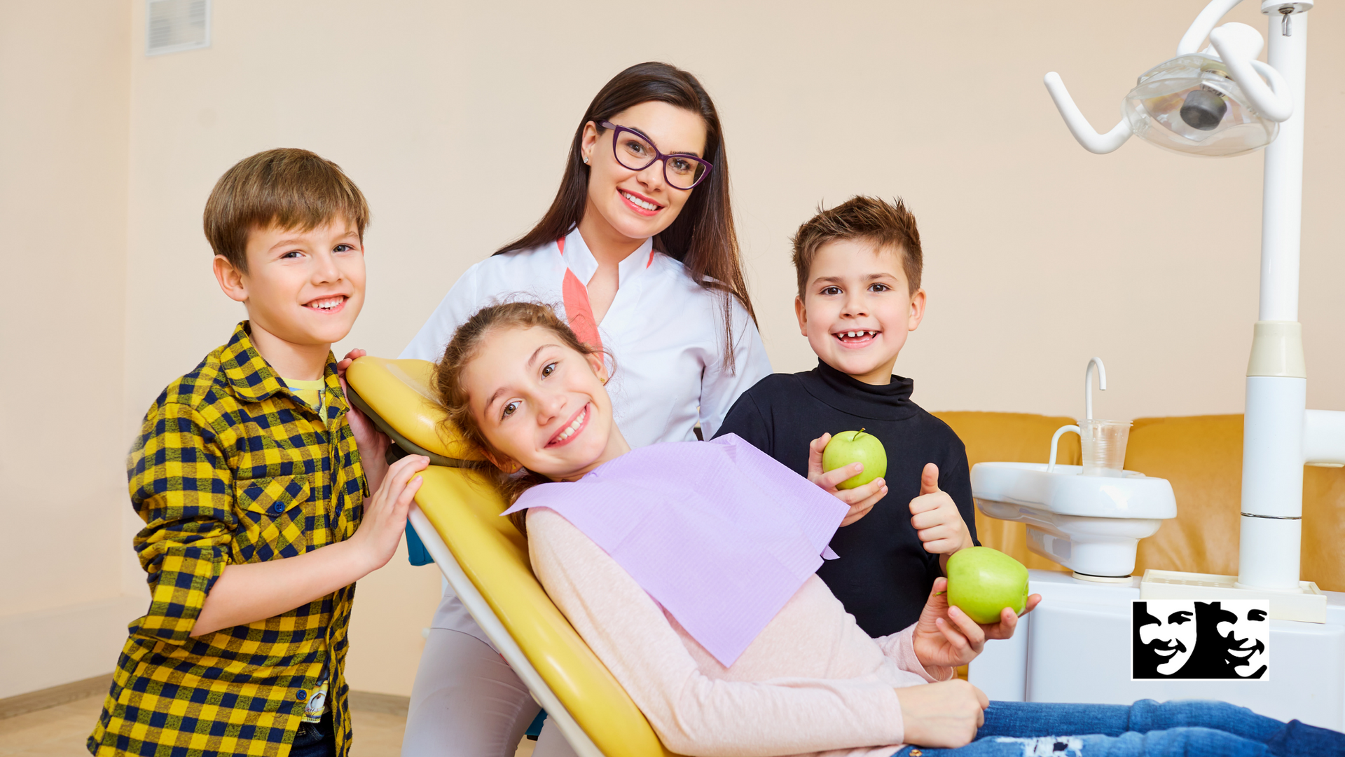 A group of children are sitting in a dental chair with a dentist.