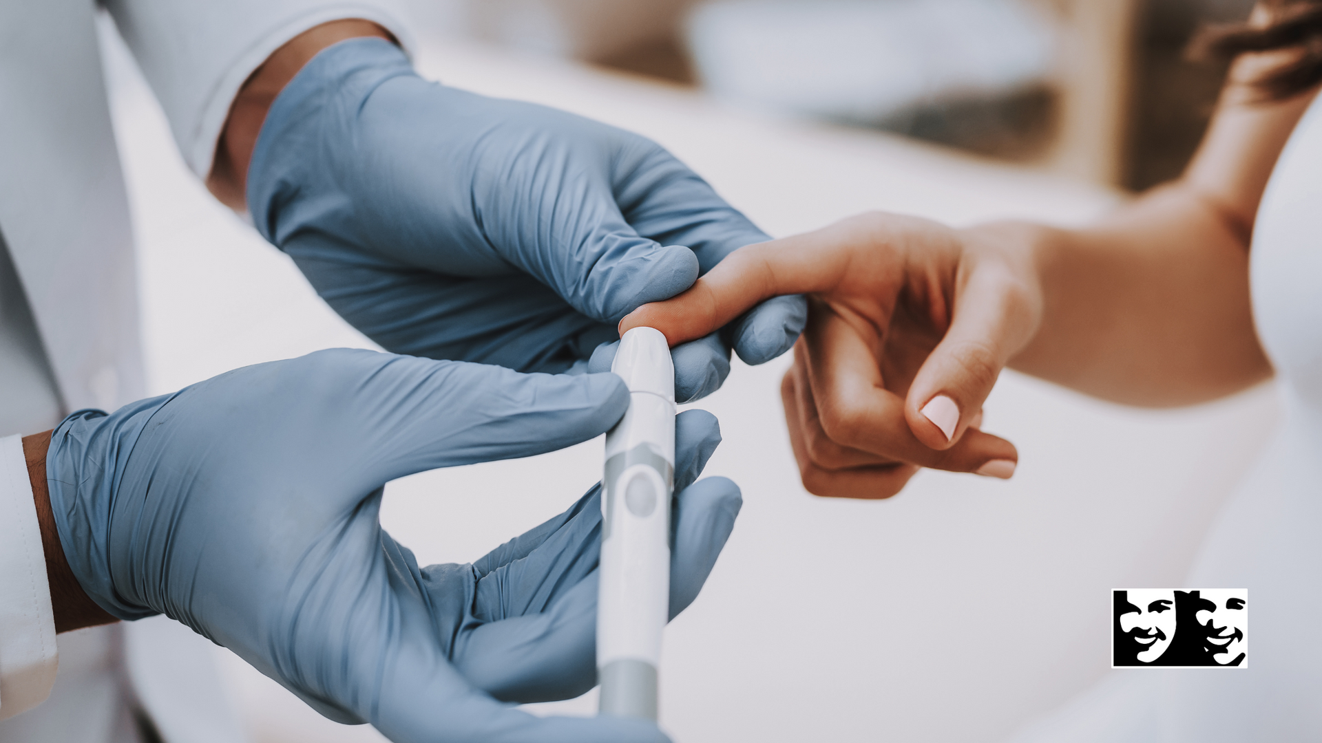 Doctor taking a blood glucose test from a patient's finger using a meter.