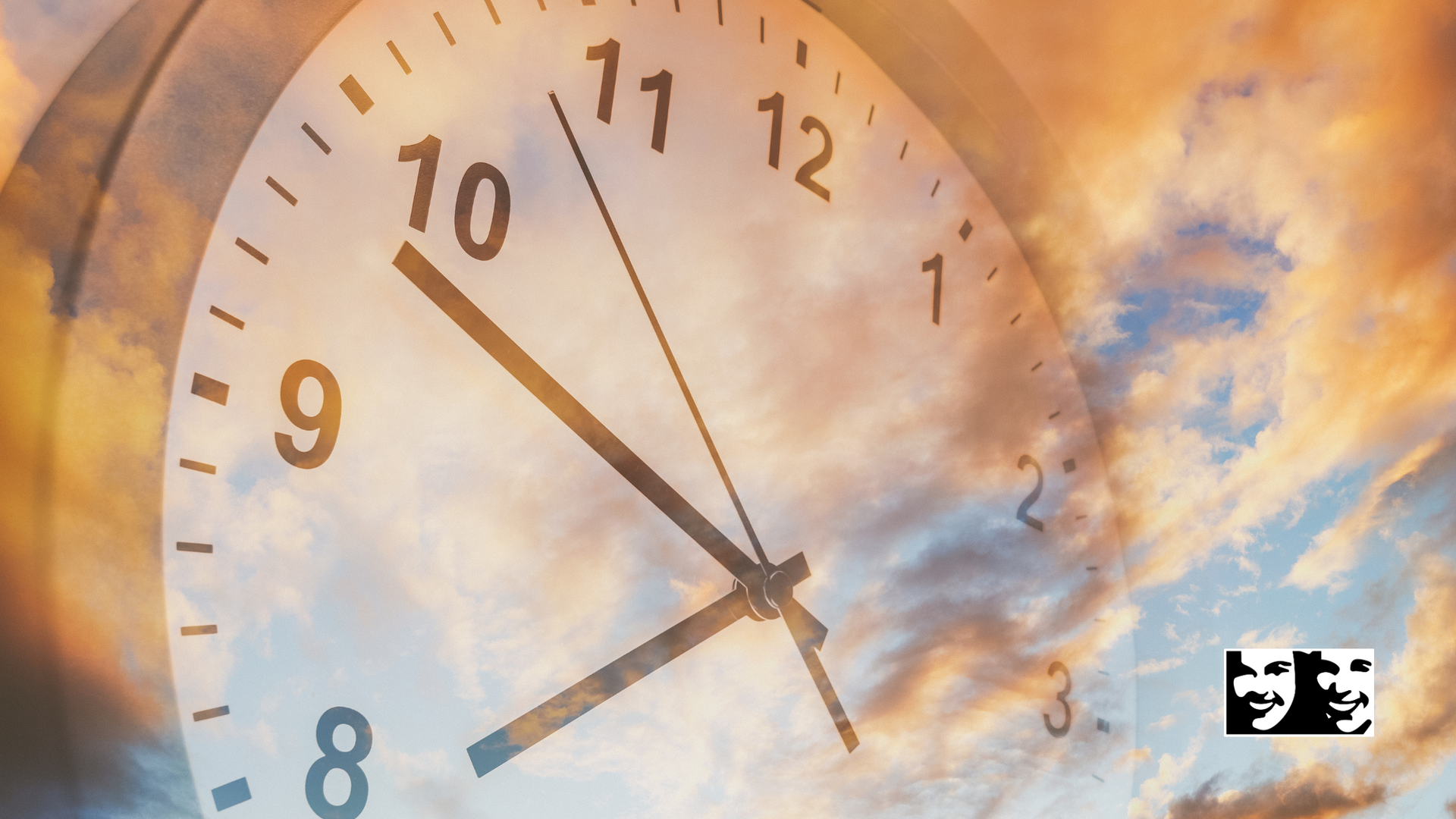 Clock face superimposed over a vibrant sky with clouds; dramatic time concept.