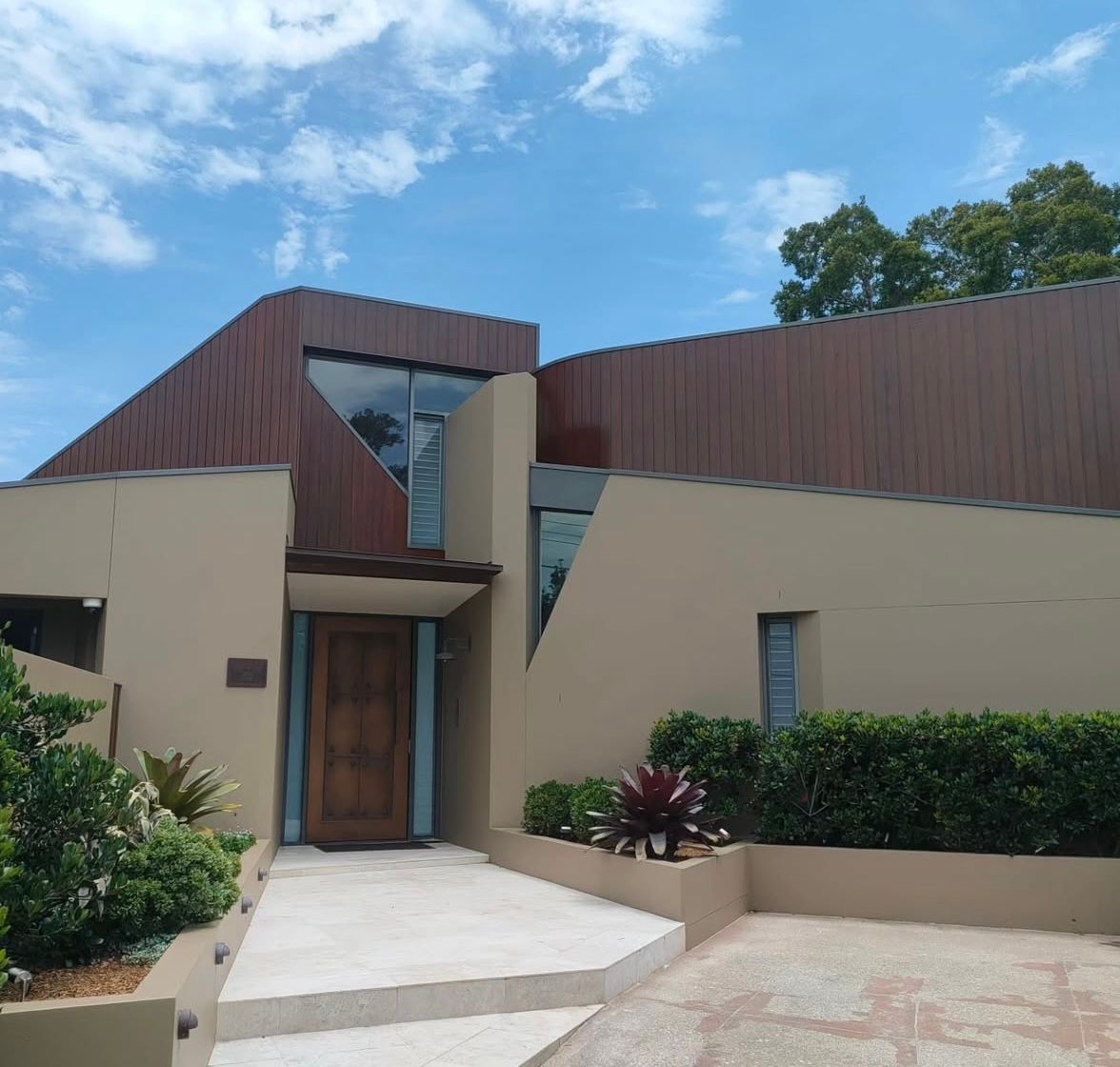A house with a large lawn in front of it — Timeless Painting In Umina Beach, NSW