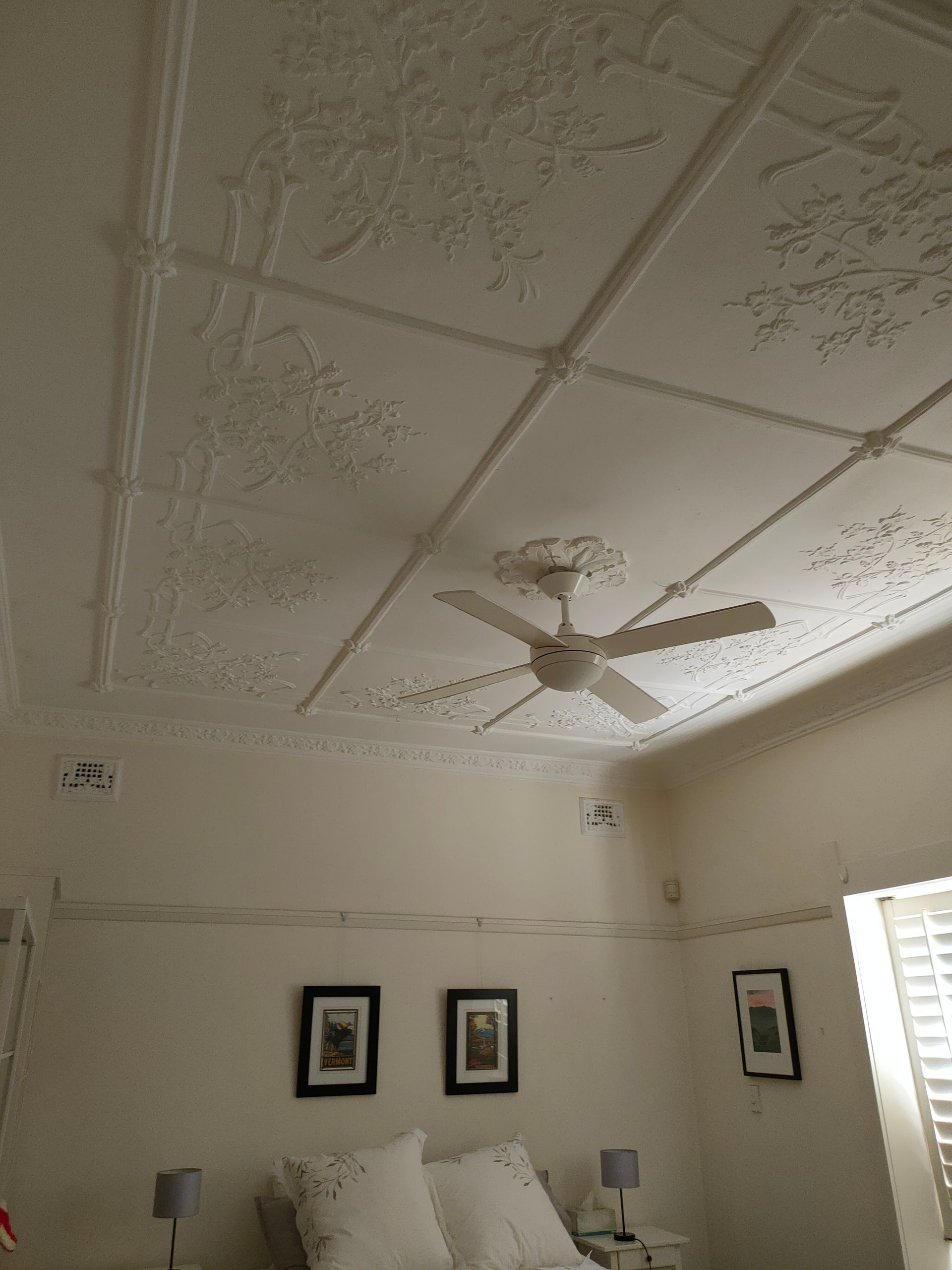 A Paint Roller is Sitting on Top of a Paint Tray — Timeless Painting In Umina Beach, NSW