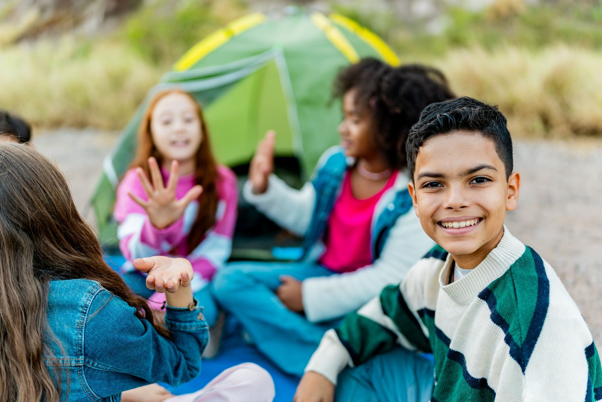 Portrait of a child boy during summer camp outdoors.