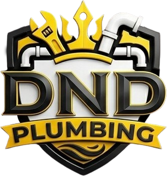 DND Plumbing logo with black, gold, and white shield, crown, and pipes.