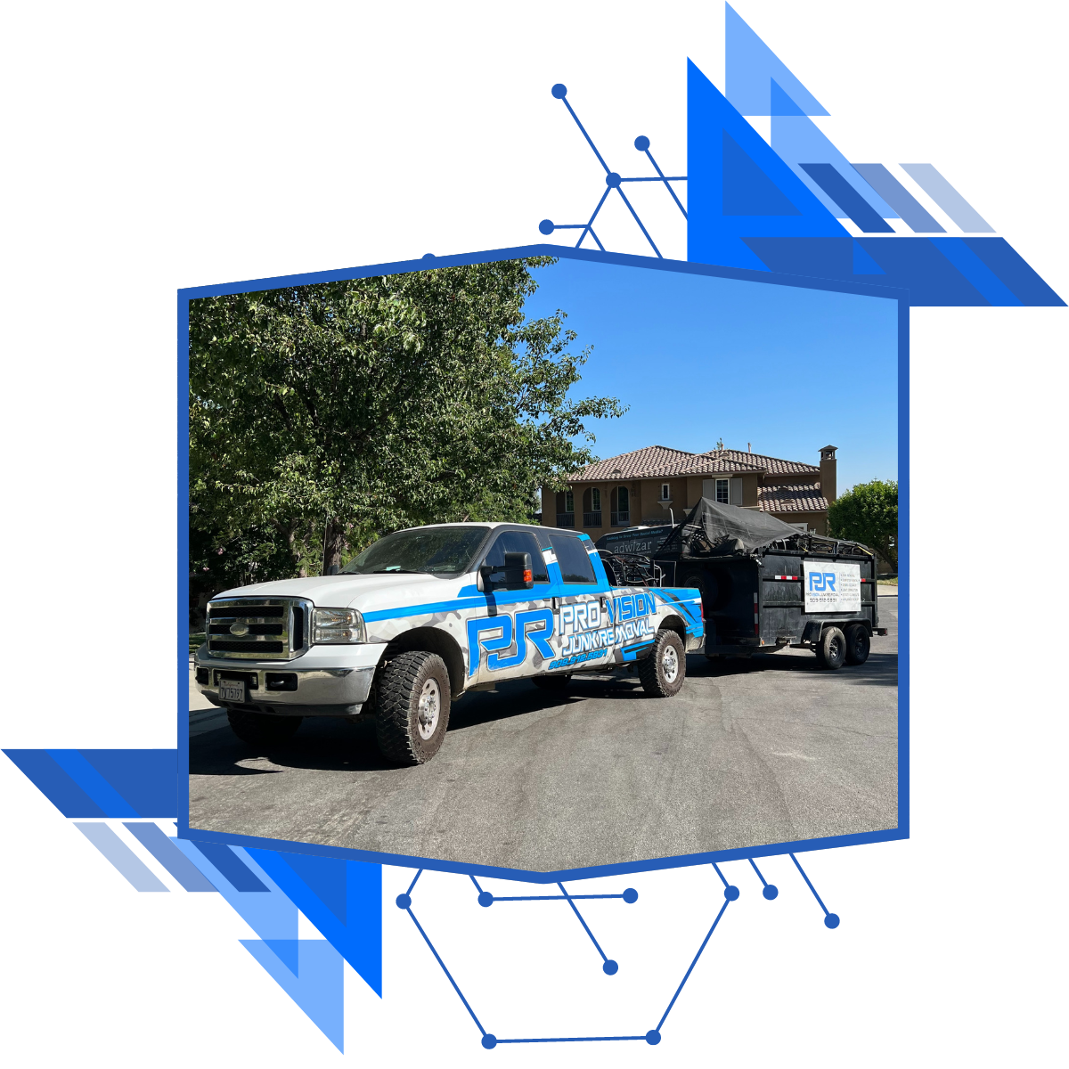 A blue dumpster filled with trash is parked on the side of the road.
