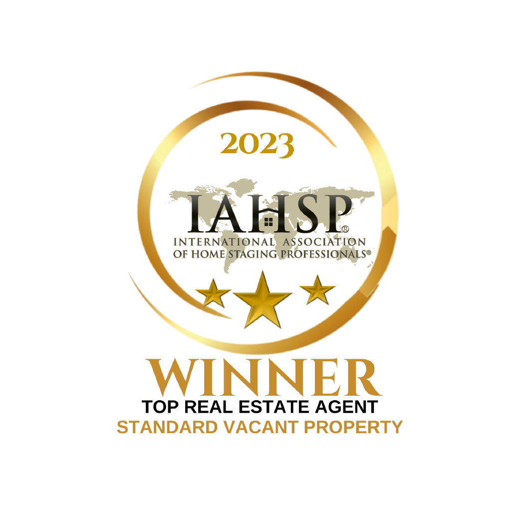 Gold 2023 IAHSP award badge reading “Winner Top Real Estate Agent Standard Vacant Property”
