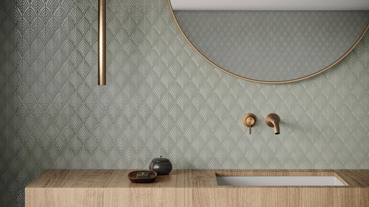 A bathroom with a sink and a mirror on the wall.