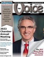 A man in a suit and tie is on the cover of a magazine.