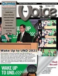 A man in a suit and tie is standing at a podium on the cover of a magazine.