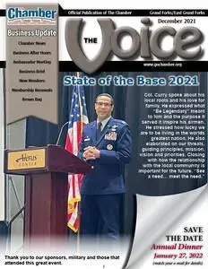 A man in a military uniform is standing at a podium in front of an american flag.