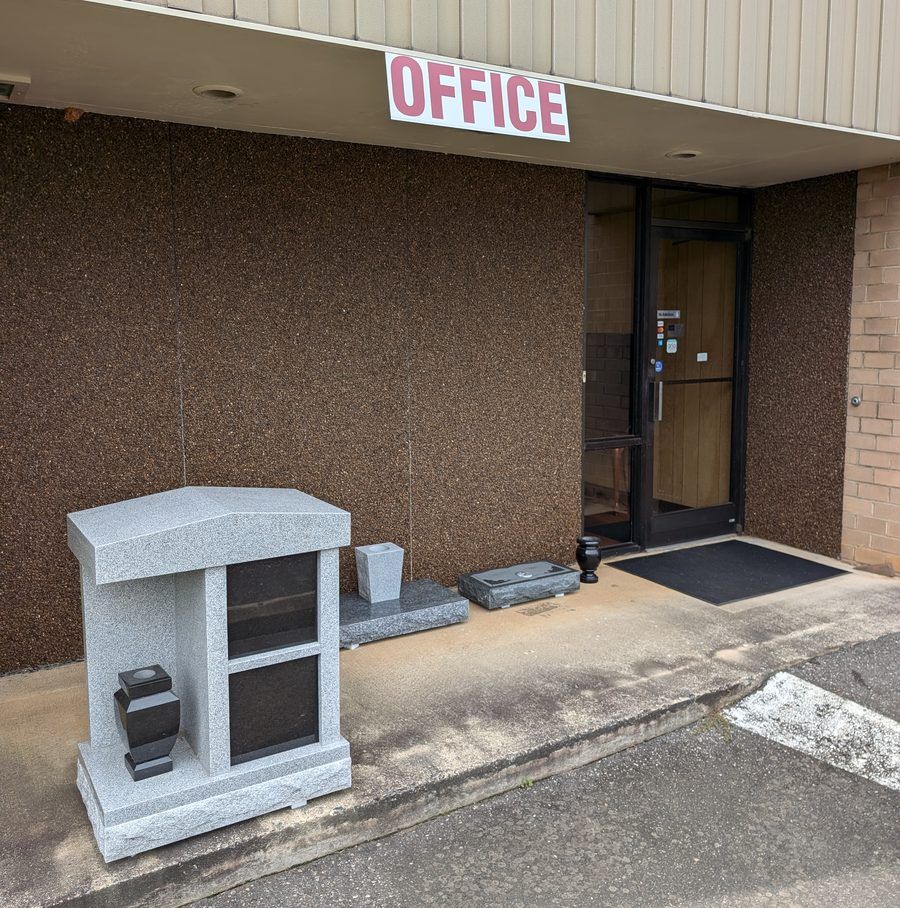 A four niche granite columbarium on display outside the office entrance at the Gaulden Monuments Gastonia showroom