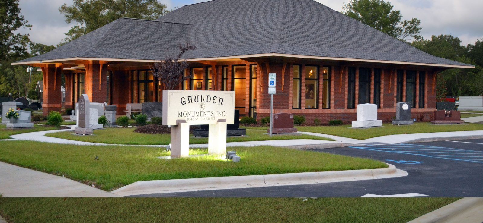 The Gaulden Monuments Rock Hill showroom, a brick building on Saluda Street with the Gaulden Monuments sign and finished monuments in the display yard out front
