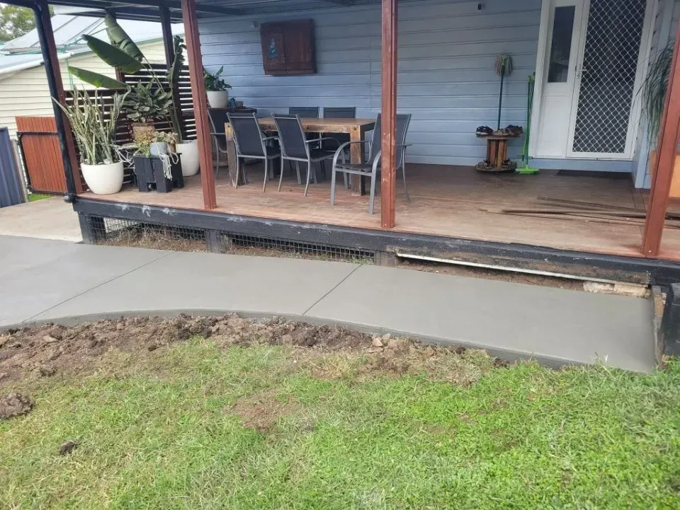 Covered Porch with Outdoor Table and Chairs — Kempsey Concrete Contractors PTY LTD In Dondingalong, NSW