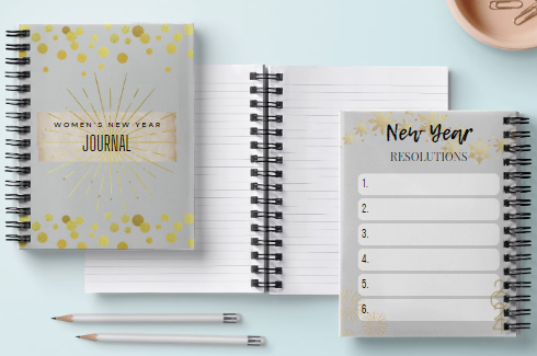 New Year's Journal set: a closed journal, open journal, and resolution page, with pencils on a light blue surface.