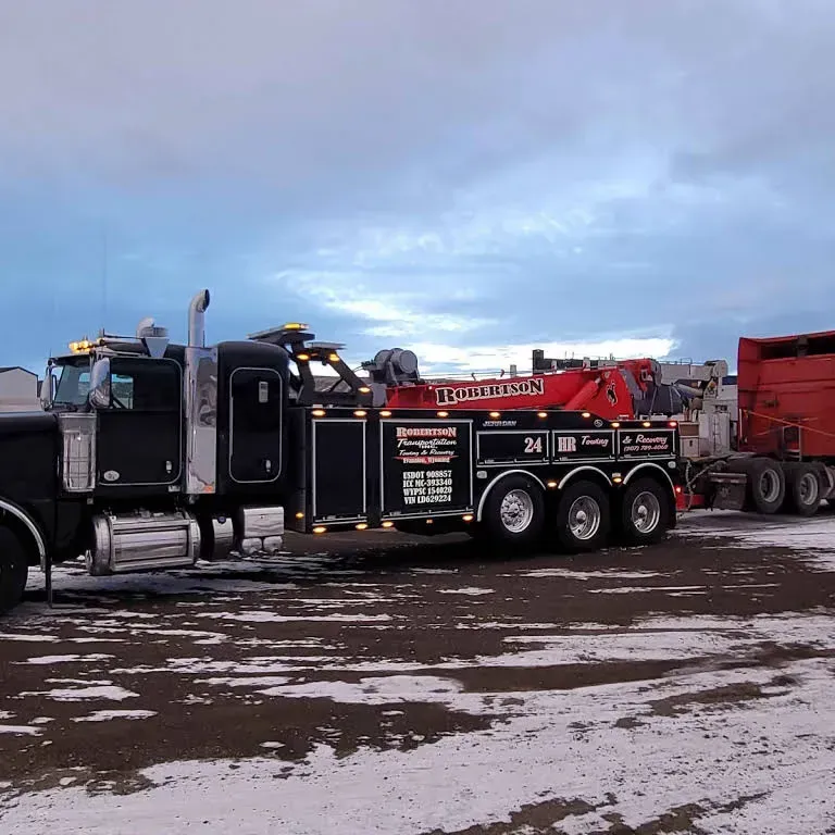 A tow truck with the number 24 on it — Evanston, WY — Robertson Transportation Inc. Towing and Recovery