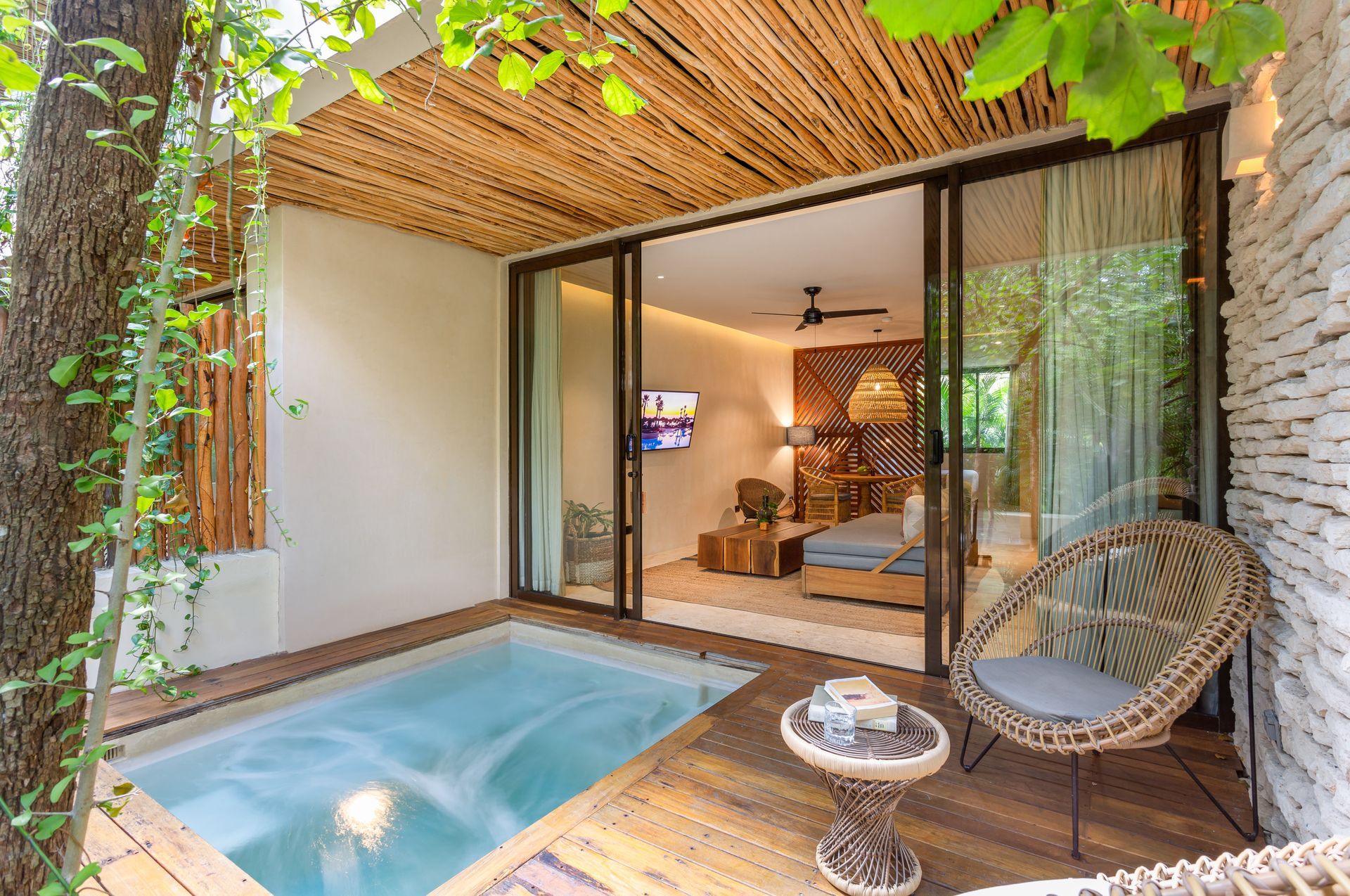 There is a small pool in the middle of the room.
