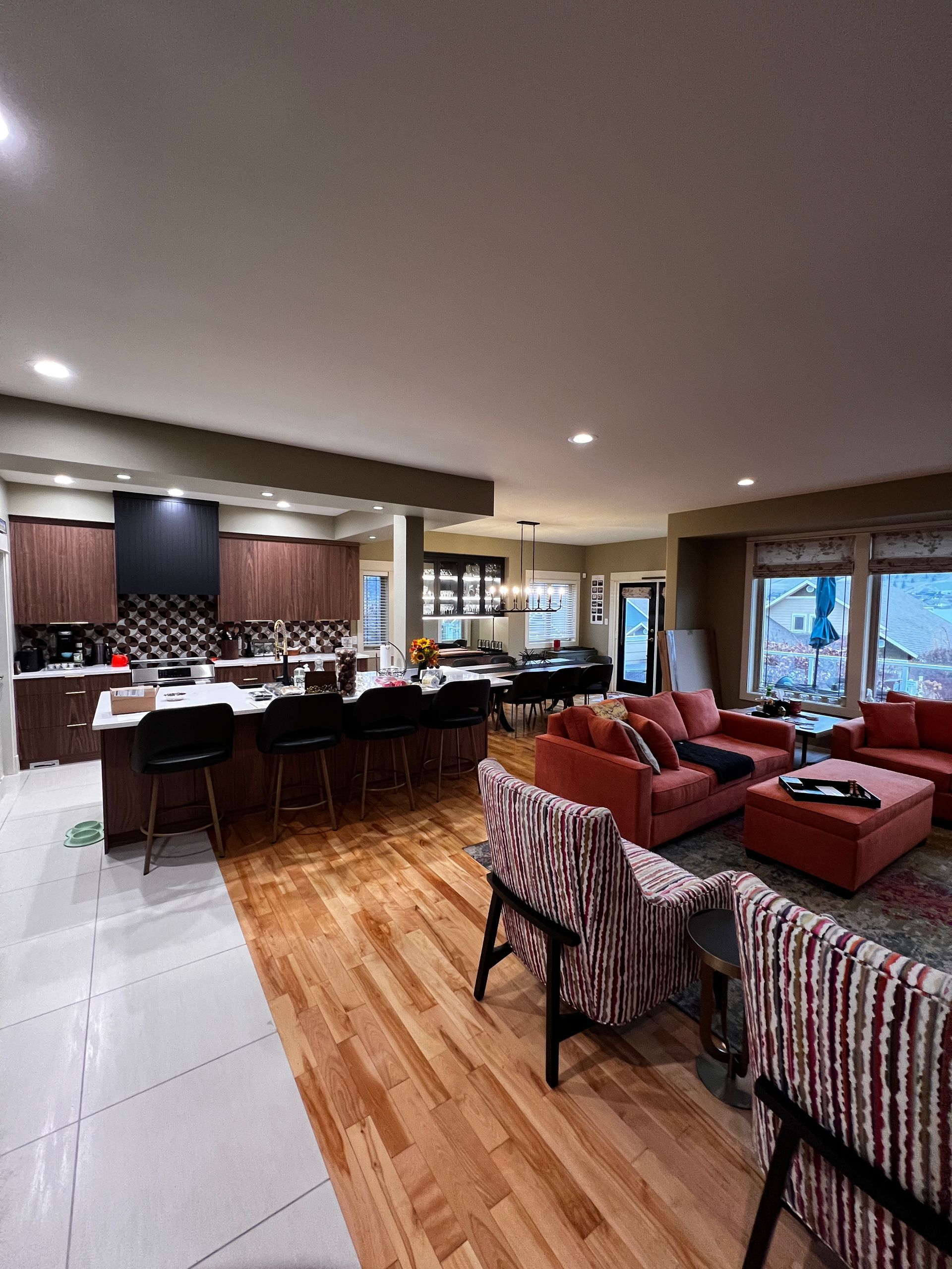 Custom Kitchen Renovation - A living room filled with furniture and a kitchen