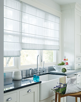 White sheer Roman shade in kitchen