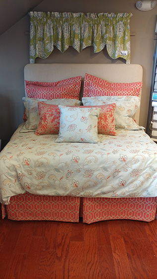 Floral bedding with coral accents