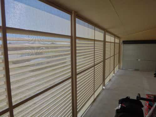 A Large Room With A Lot Of Windows And Blinds — Summerland Screens & Awnings In Suffolk Park, NSW