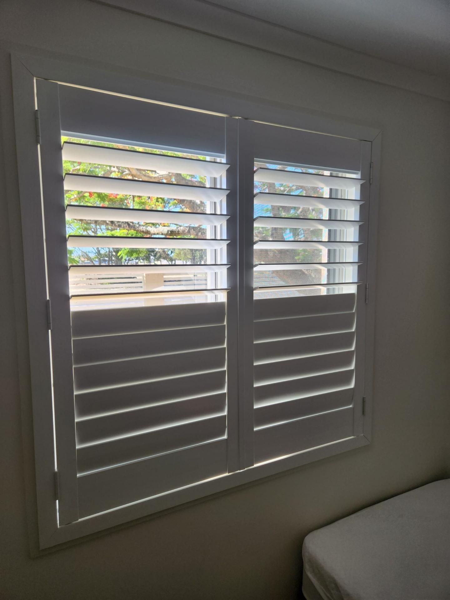 A Close Up View O White Shutters — Summerland Screens & Awnings In Ballina, NSW