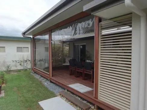 A House With A Patio And A Sliding Glass Door — Summerland Screens & Awnings In Ballina, NSW