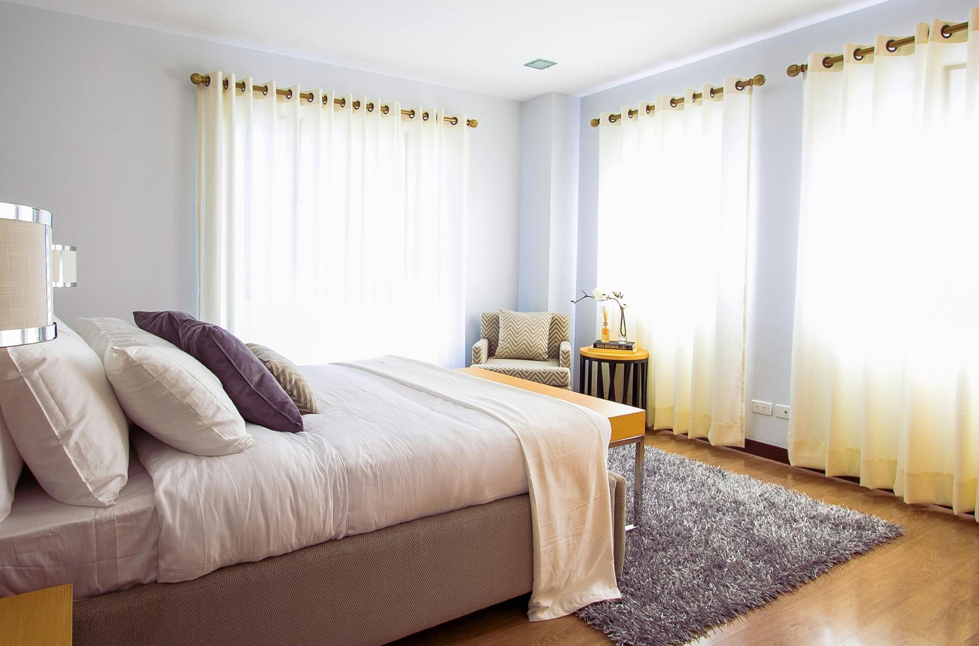Curtains in a beautiful bedroom— Summerland Screens & Awnings In Ballina, NSW
