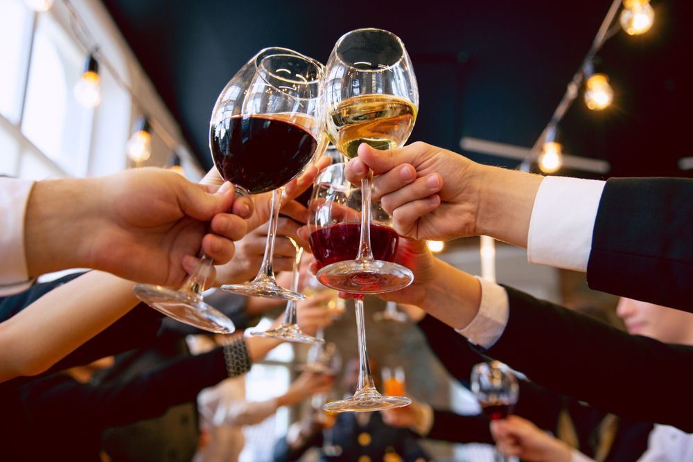 People Toasting With Wine Glasses — Rustique on the Coast In Ourimbah, NSW