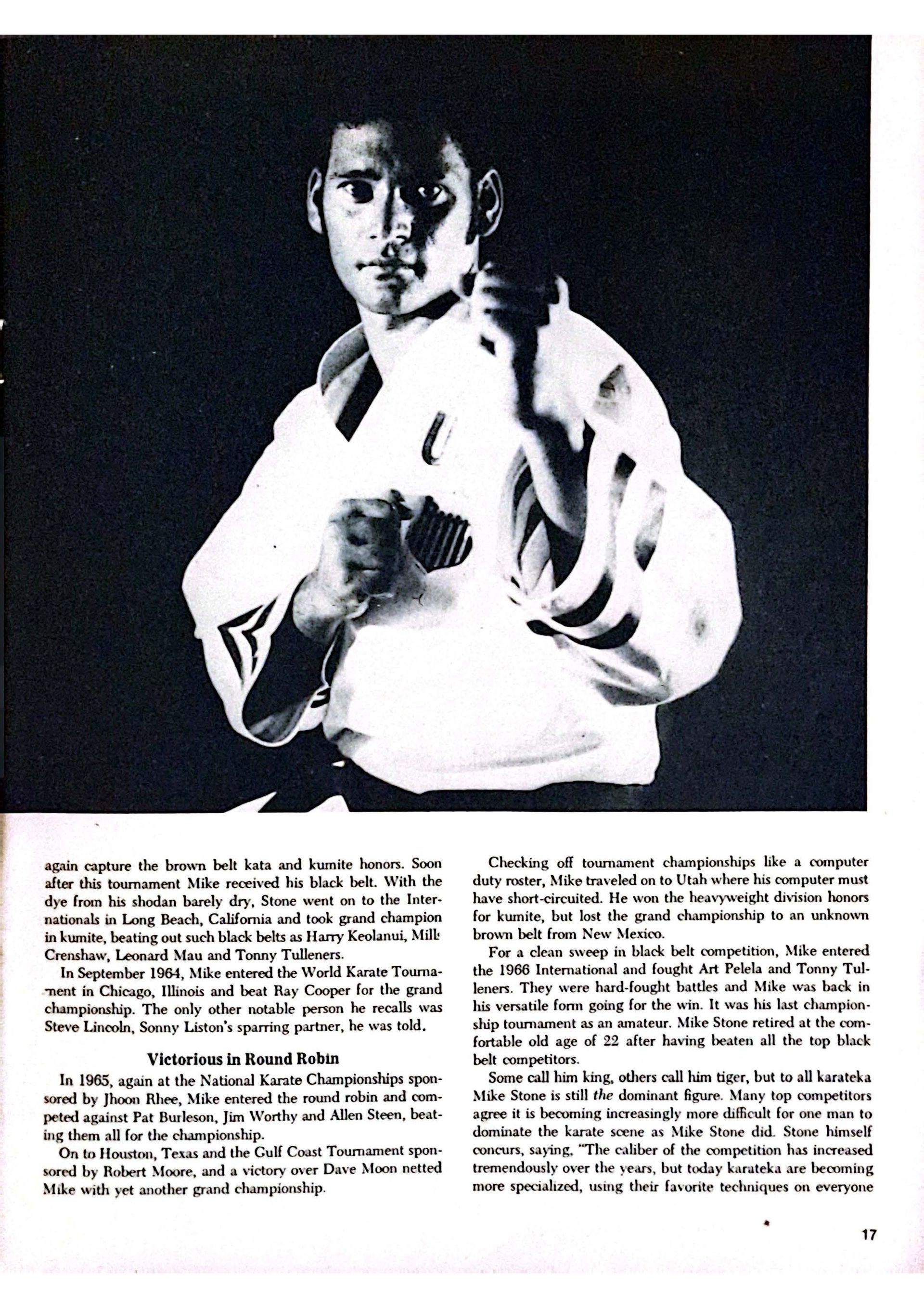 A man in a karate uniform, in a fighting stance, with black belt and determined expression. Black and white photo.