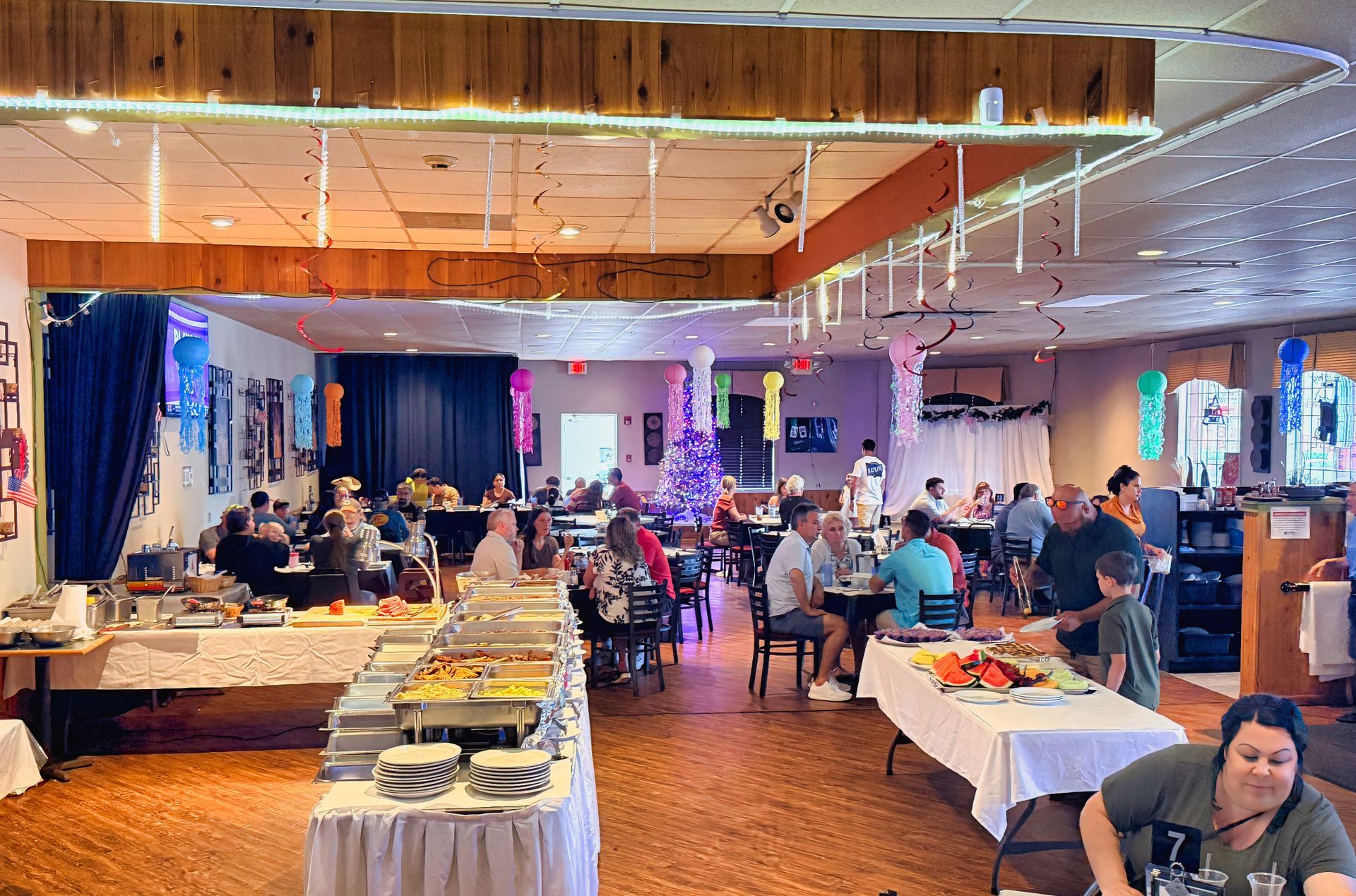 Busy Sunday brunch buffet and dining room at Dockers North