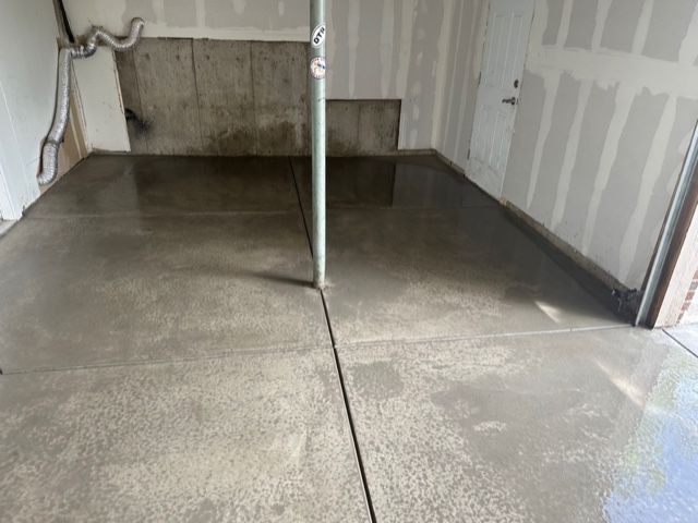 Concrete Floor in Basement with Pipe in Middle - Elizabeth, CO – NRK Skidsteer Concrete Floor in Basement with Pipe in Middle - Elizabeth, CO – NRK Skidsteer