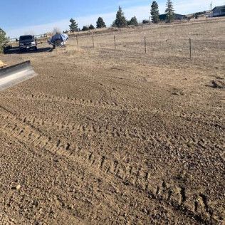 Truck Tracks on Field - Elizabeth, CO – NRK Skidsteer