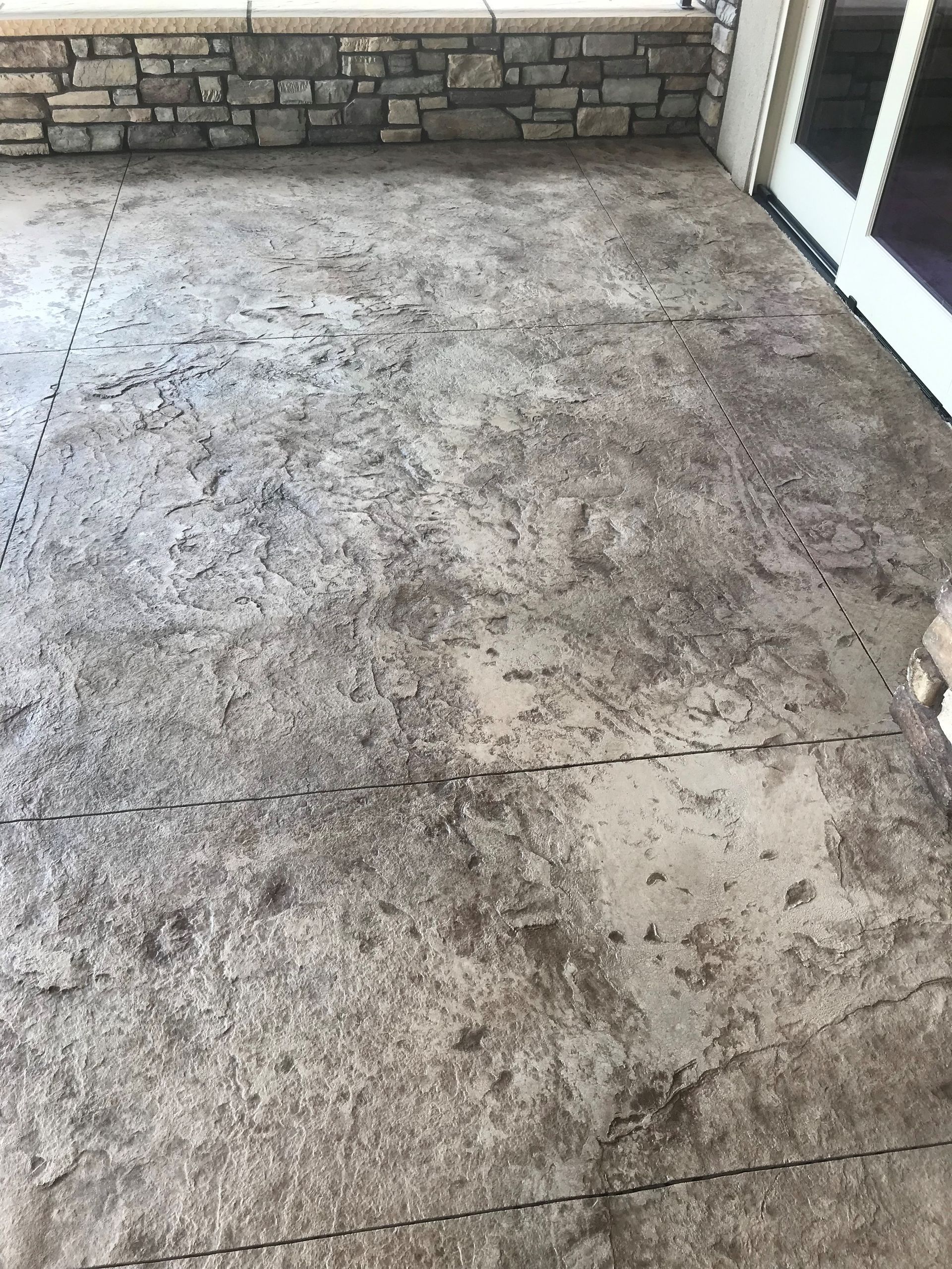 Garage with Concrete Floor and Bicycle on Wall - Elizabeth, CO – NRK Skidsteer Garage with Concrete Floor and Bicycle on Wall - Elizabeth, CO – NRK Skidsteer