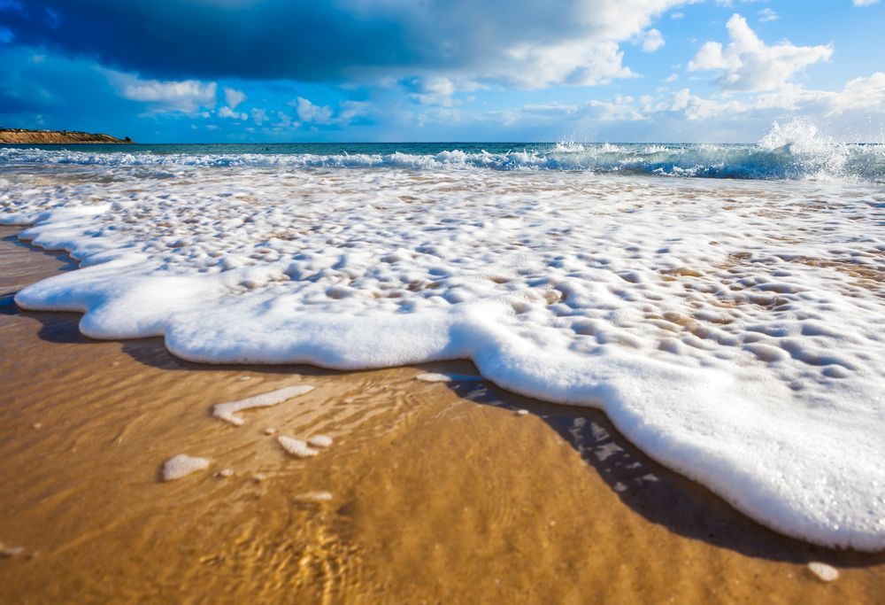 A Close Up Of Waves Crashing On A Sandy Beach — Donnelly Painting In Wollongbar, NSW