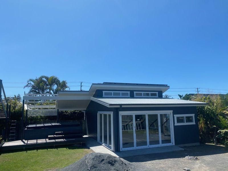 A Small House With A Lot Of Windows And A Blue Sky In The Background — Donnelly Painting In Wollongbar, NSW