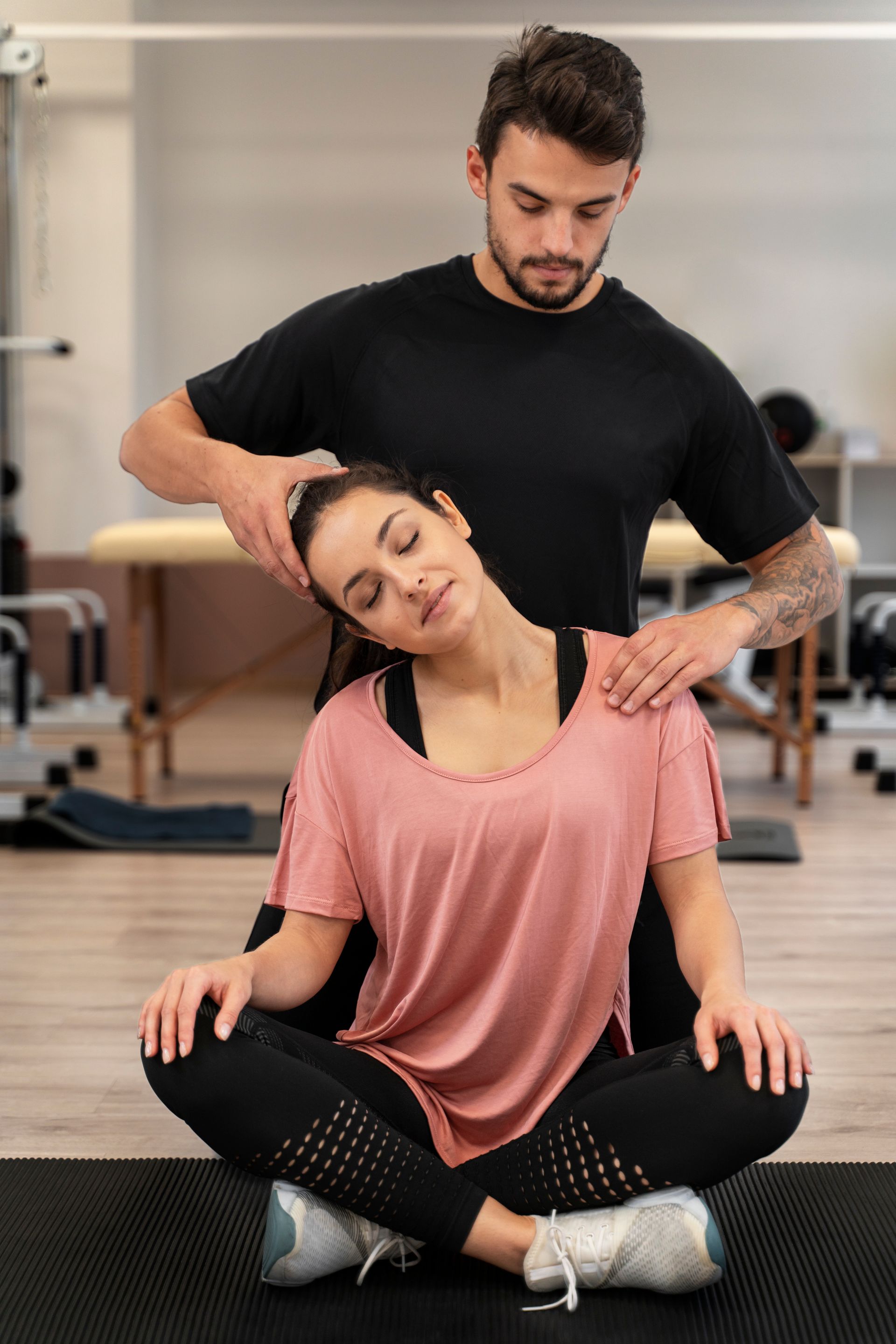 chiropractor examining neck