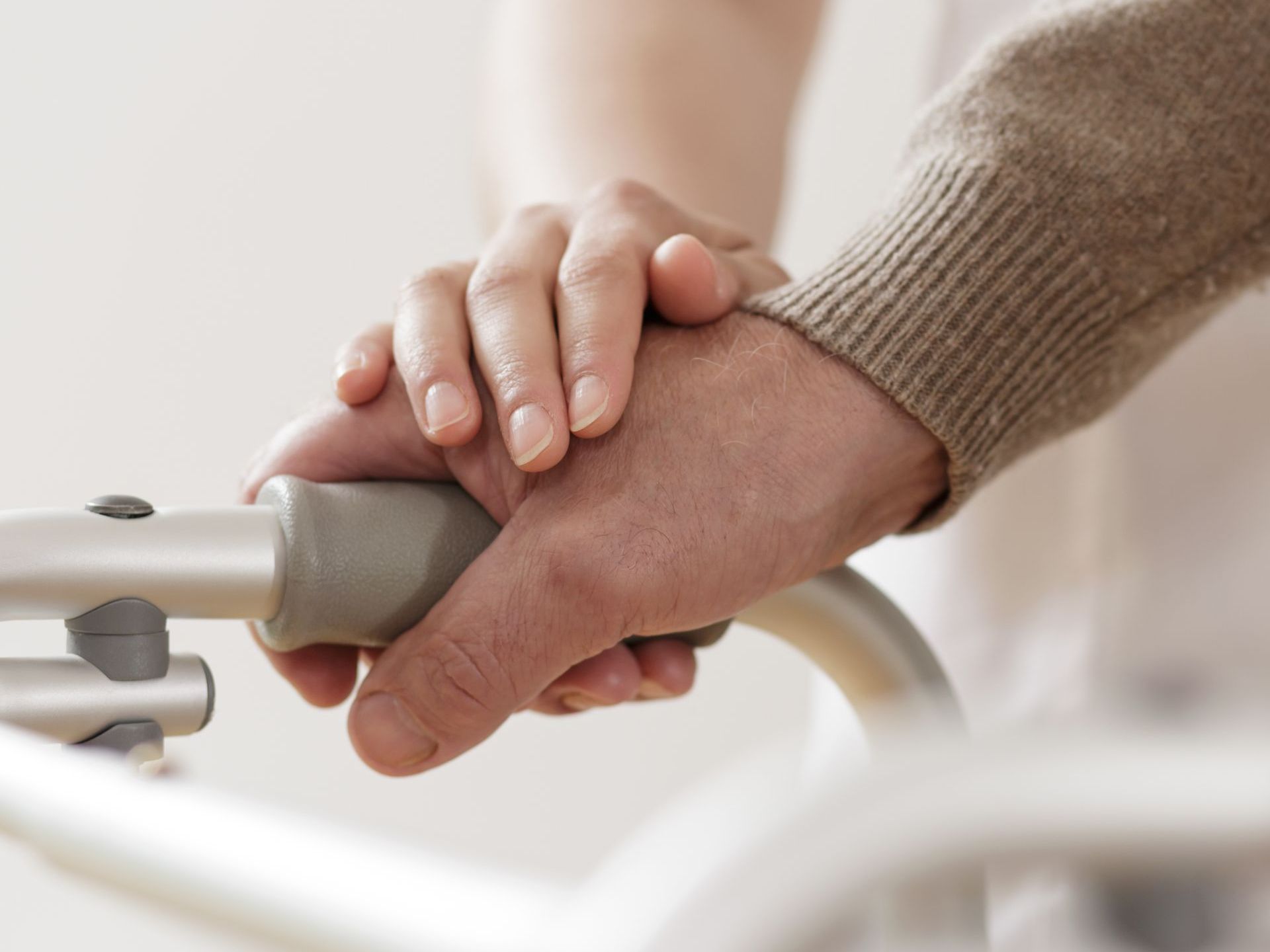 person holding hand comforting