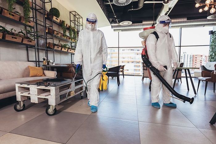 Workers Disinfecting An Apartment — Charleston, SC — Low Country Remediation Workers Disinfecting An Apartment — Charleston, SC — Low Country Remediation