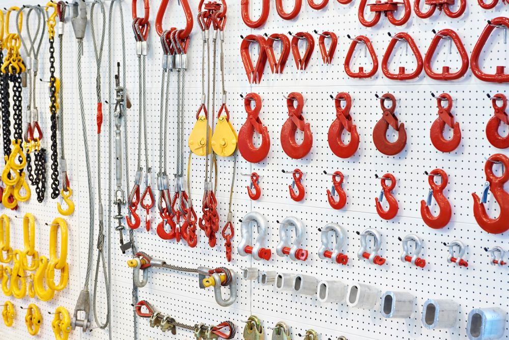 A Pegboard Display Showcasing Various Industrial Lifting Equipment — Air & Lift Gear in Buderim, QLD