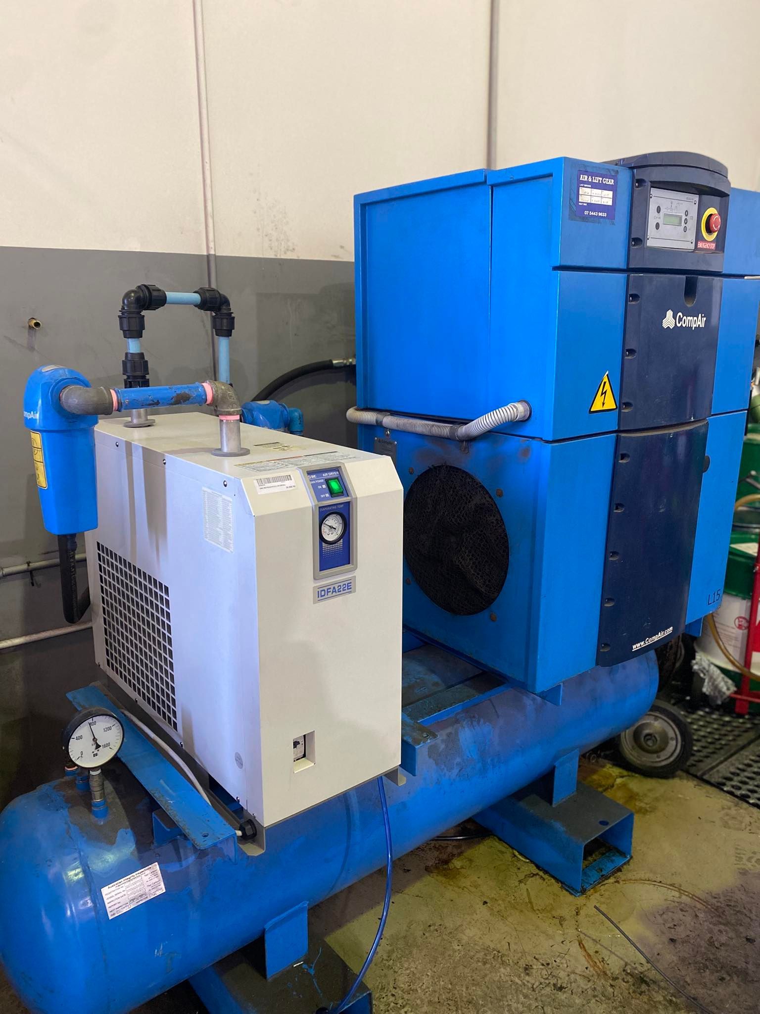 Blue Industrial Machine and White Compressor Unit — Air & Lift Gear in Buderim, QLD