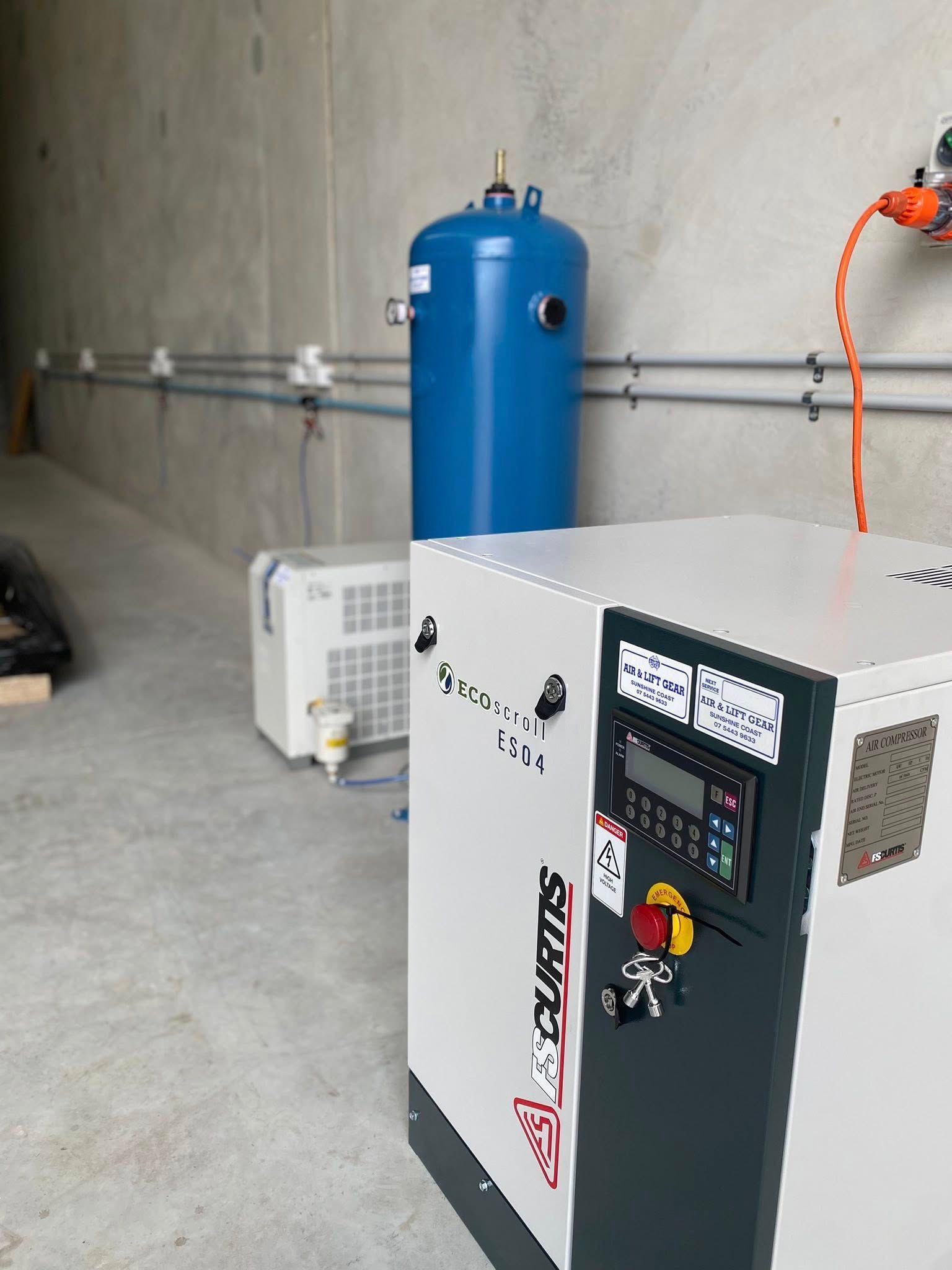A White Industrial Curtis Air Compressor With a Digital Display — Air & Lift Gear in Buderim, QLD