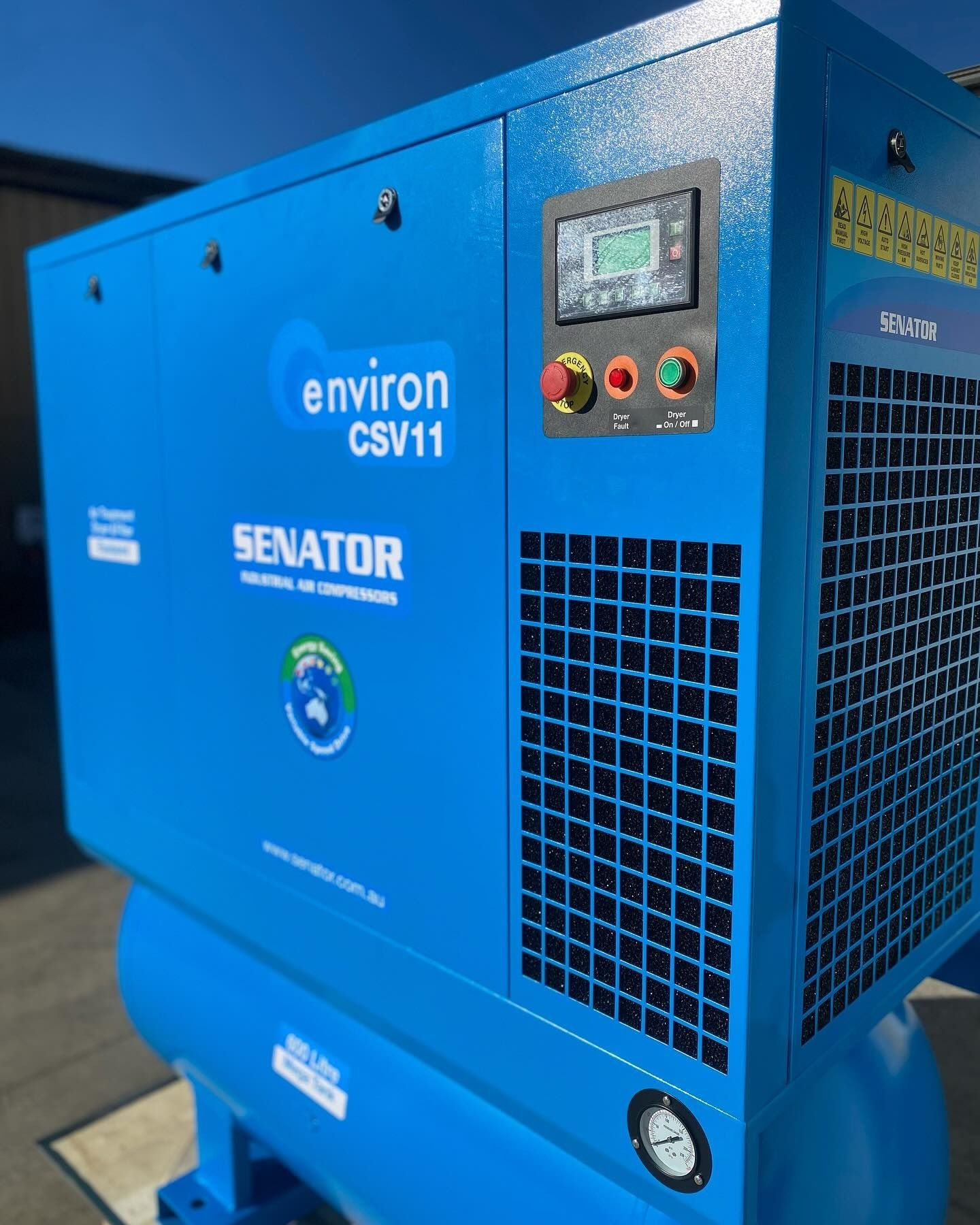 Blue industrial air compressor unit with control panel and vents in a workshop setting— Air & Lift Gear in Buderim, QLD
