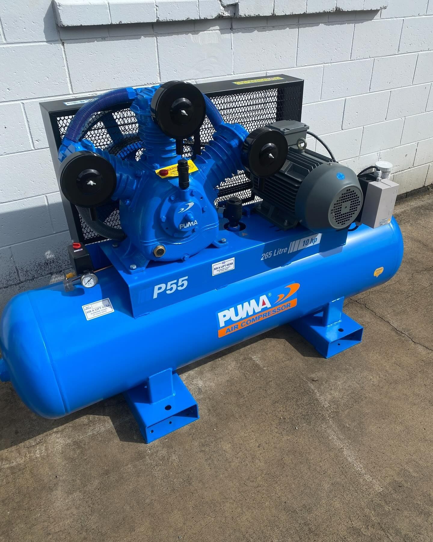 A Blue Puma P56 Industrial Air Compressor Sitting on a Concrete Surface — Air & Lift Gear in Buderim, QLD