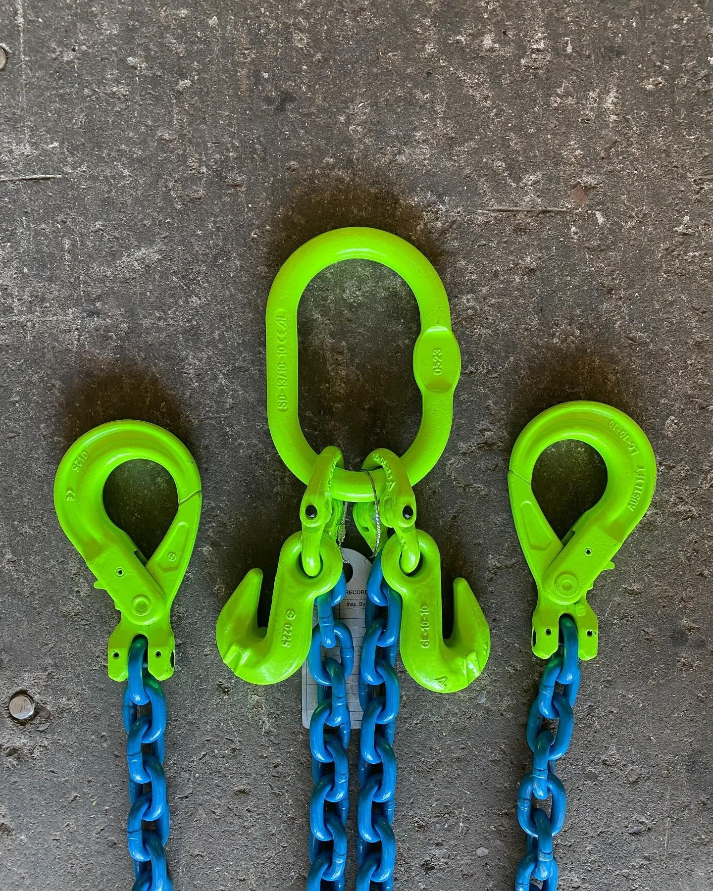Three Bright Green Chain Hooks With Blue Chains Hanging — Air & Lift Gear in Buderim, QLD