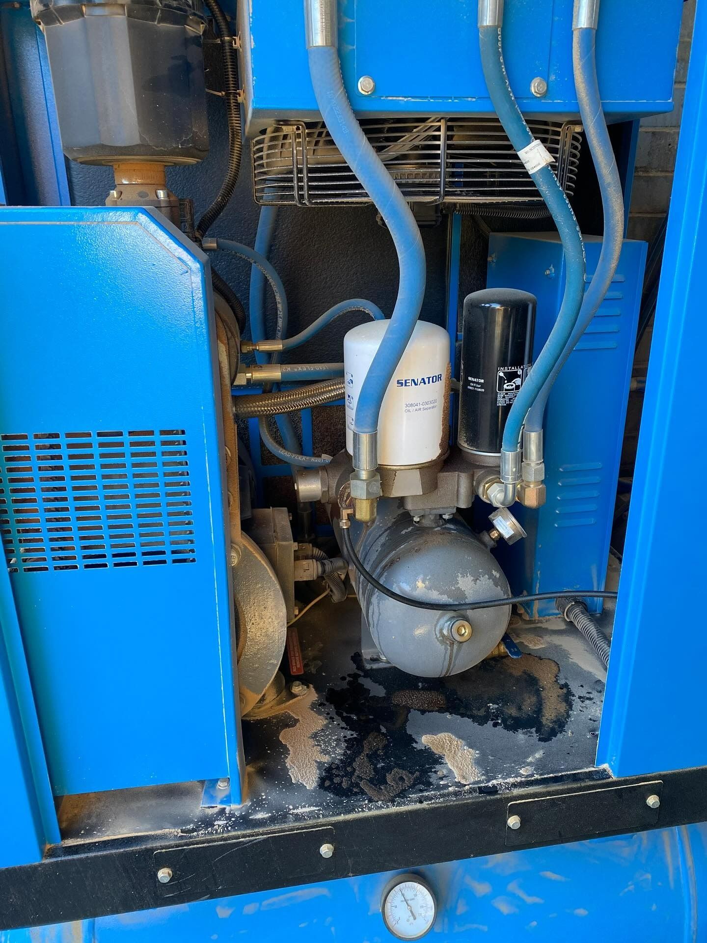 Blue Industrial Machinery and a Gray Pressure Tank Inside  — Air & Lift Gear in Buderim, QLD