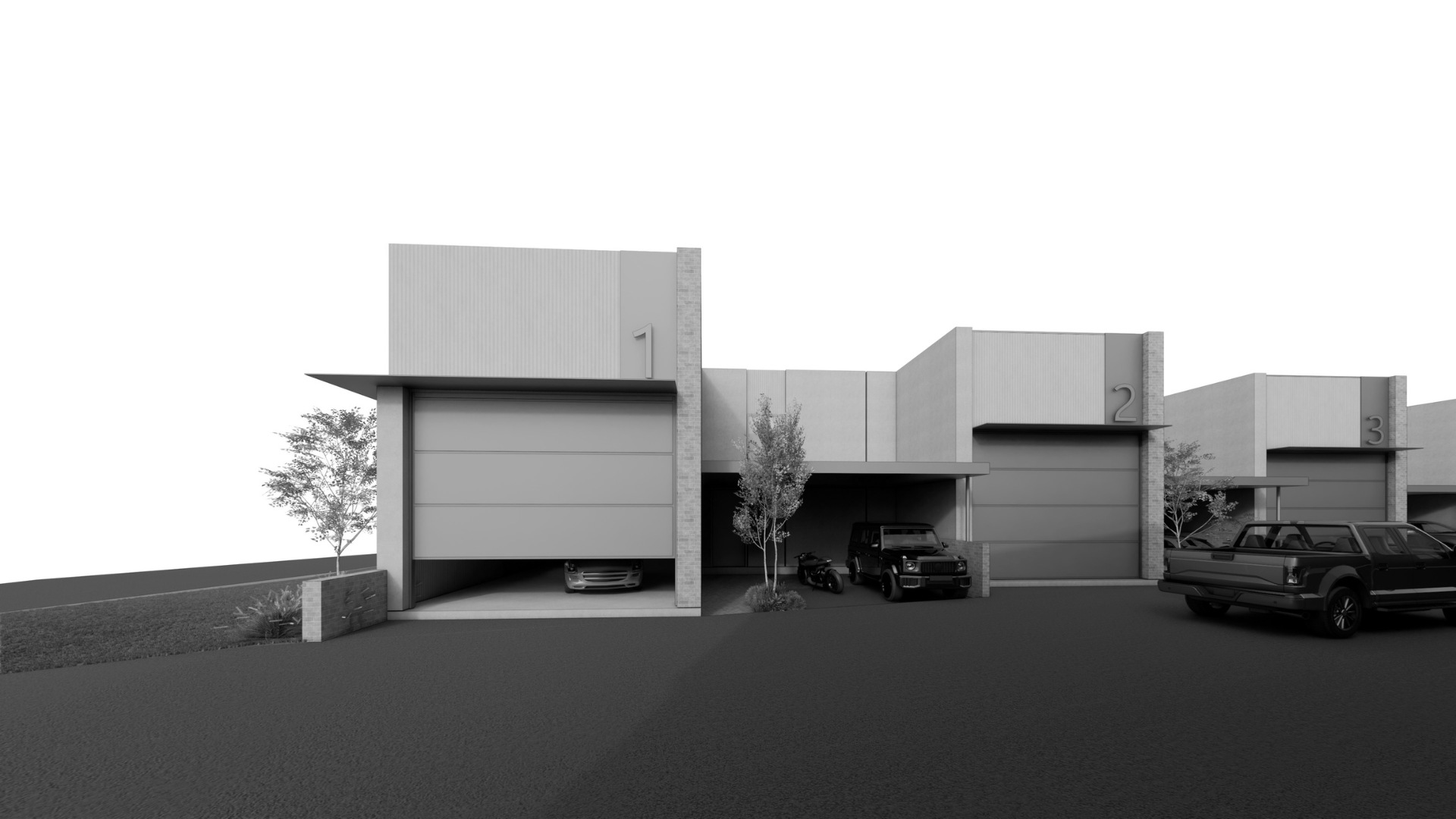 Modern row houses with attached garages and parked cars on a paved driveway