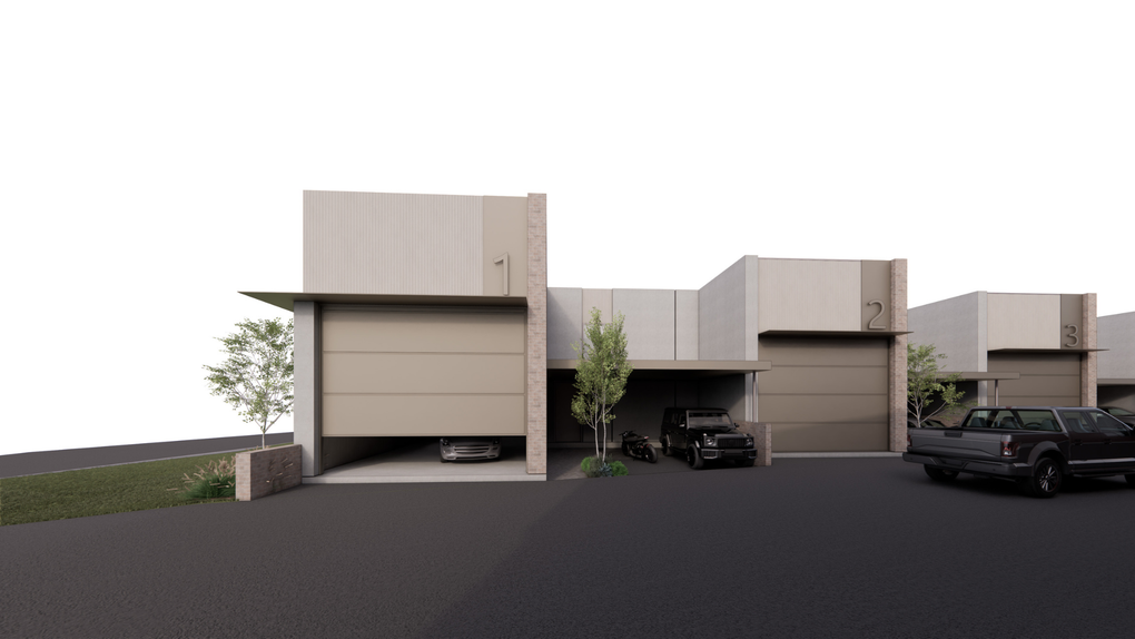 Row of modern beige townhomes with garage doors and parked cars in a paved courtyard