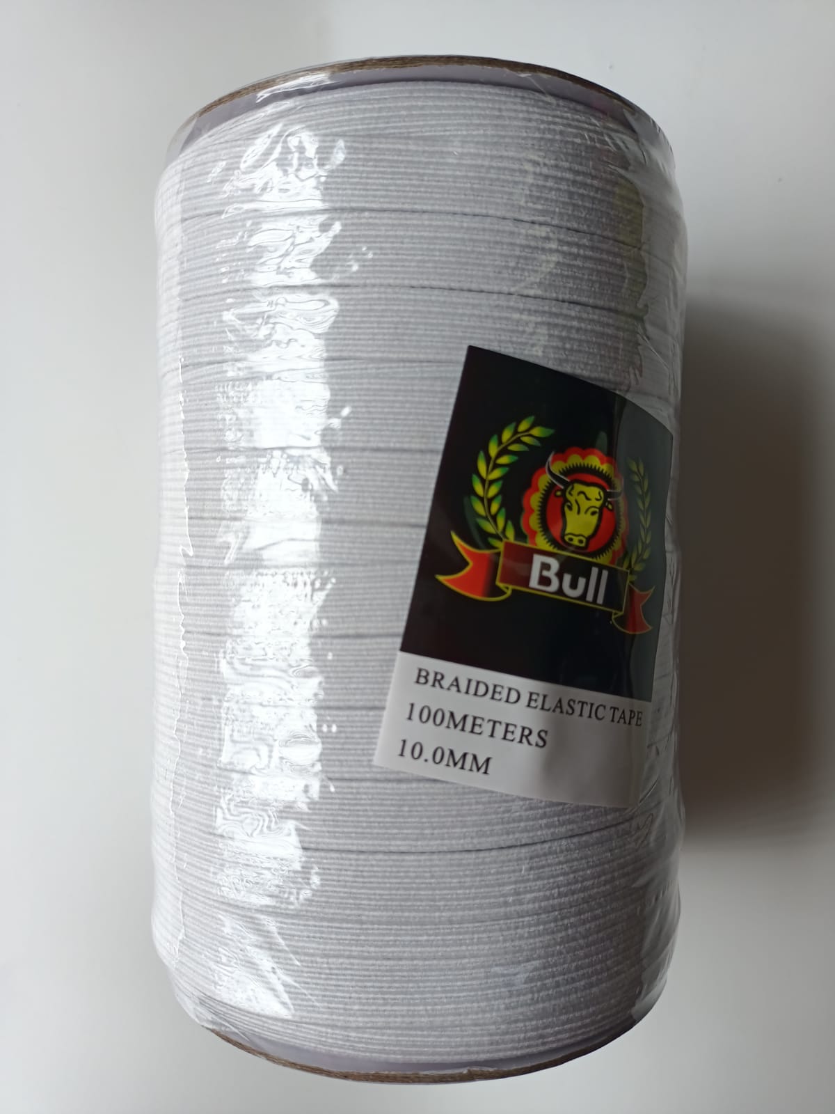 White braided cable spool with a Bull label on the front