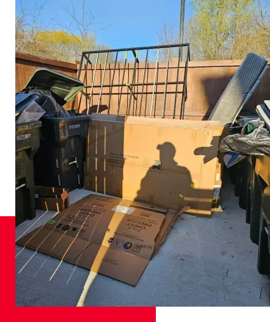 cardboard, bed frame, junk in yard, yard cleanups in Middle TN