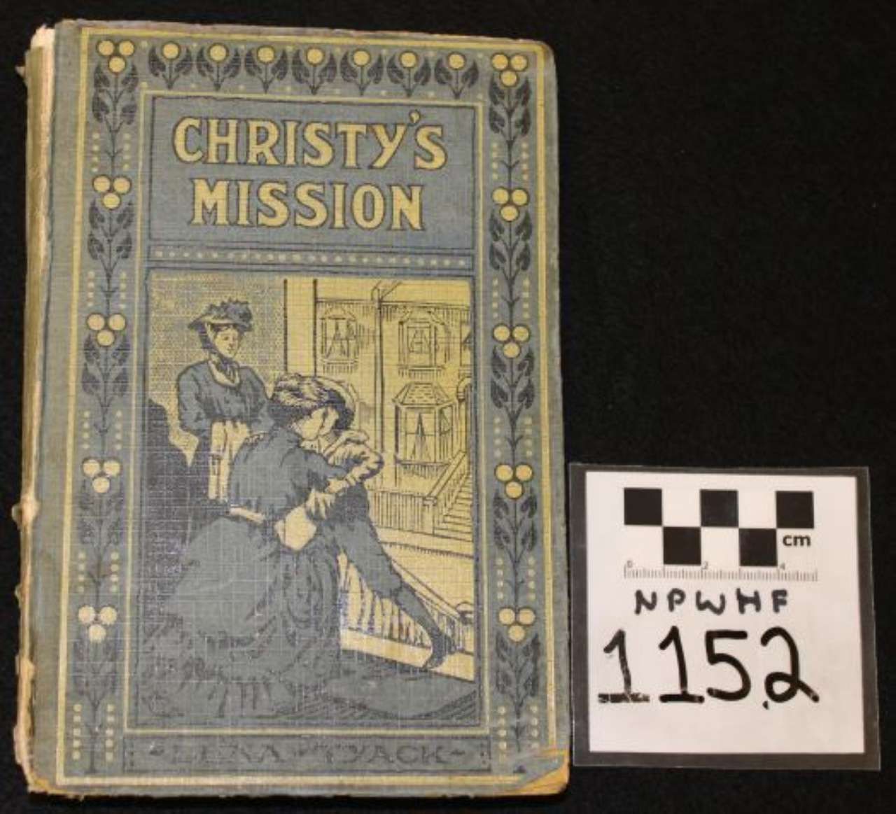 Cover of “Christy’s Mission” beside a white catalog label marked 1152, on a black background.